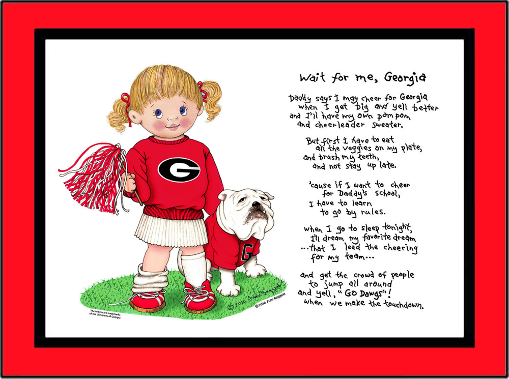 Georgia toddler cheerleader standing in the grass with her bulldog puppy beside her. She is wearing red bows in her hair, a Georgia sweatshirt, pleated skirt and sneakers with socks. She is holding a pom pom in one hand.